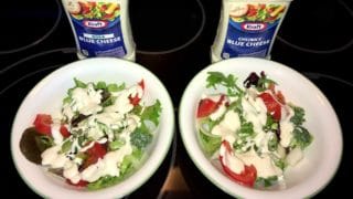 two bowls of salad used for comparing Kraft Roka Blue Cheese dressing vs Kraft Chunky Blue Cheese dressing