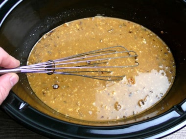 cook whisking beefy-mushroom gravy for slow-cooker pork chops
